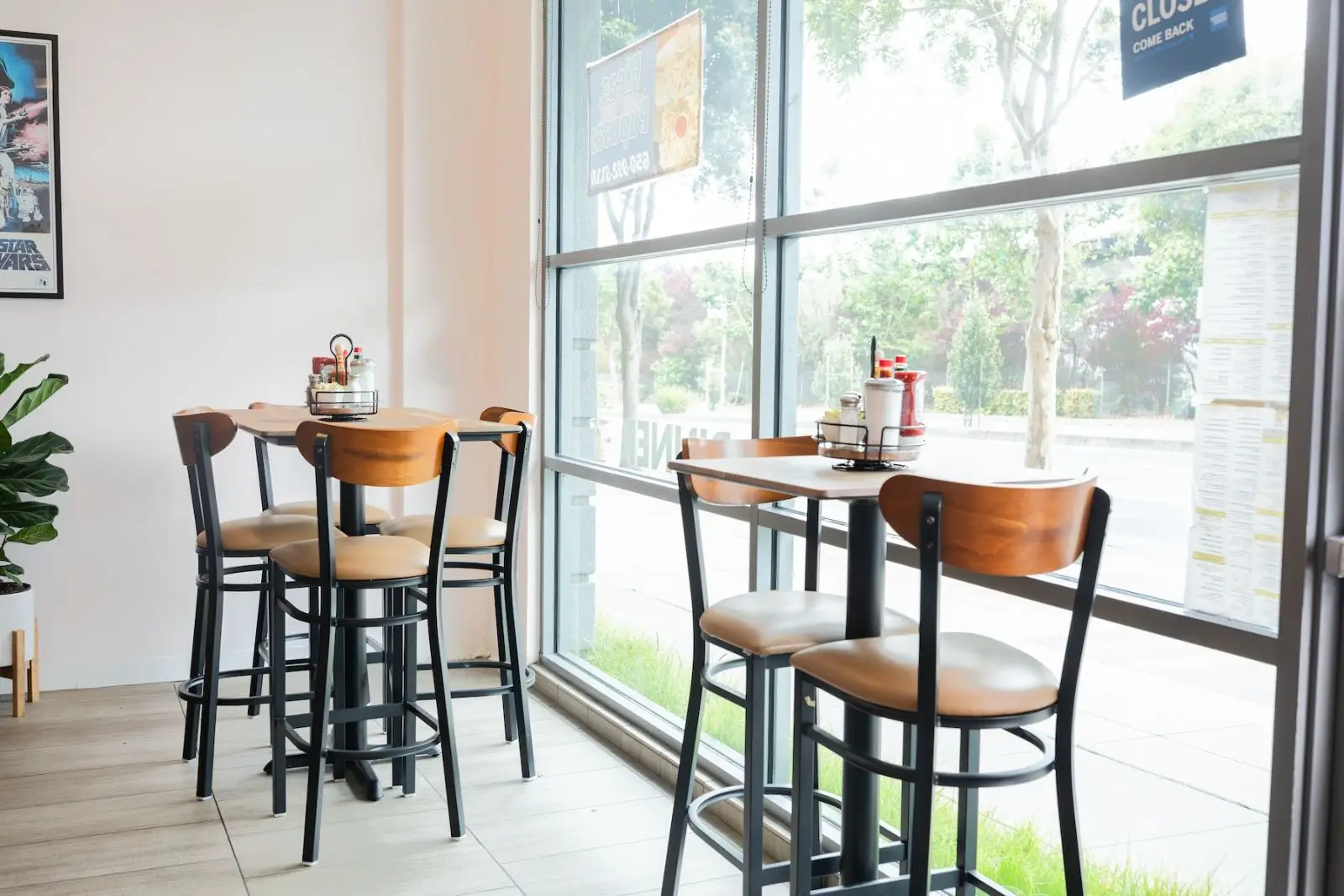 Inside Westlake Coffee Shop — window seating with wood tables