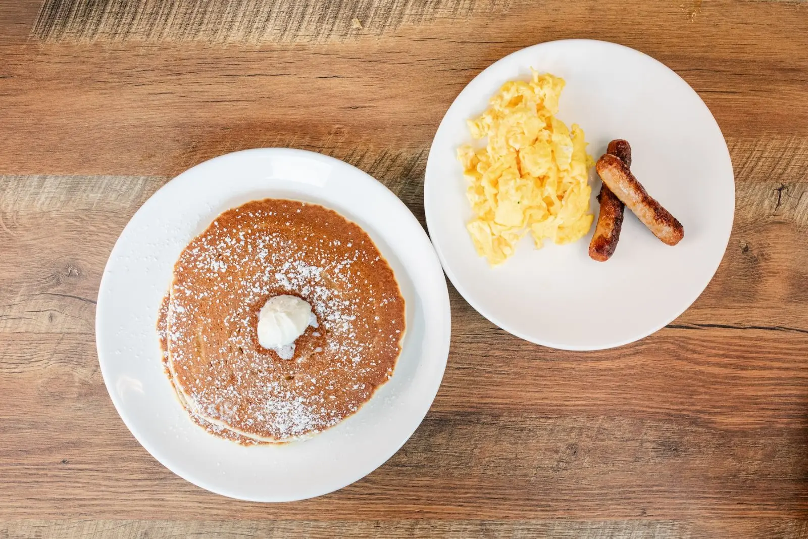Pancakes with scrambled eggs and sausage